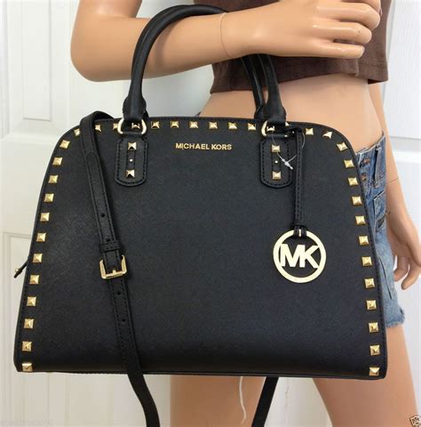 michael kors gold ring black purse|Michael Kors gold purse large.